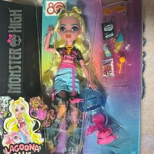 Monster High Doll with Blonde Hair and Pink Outfit